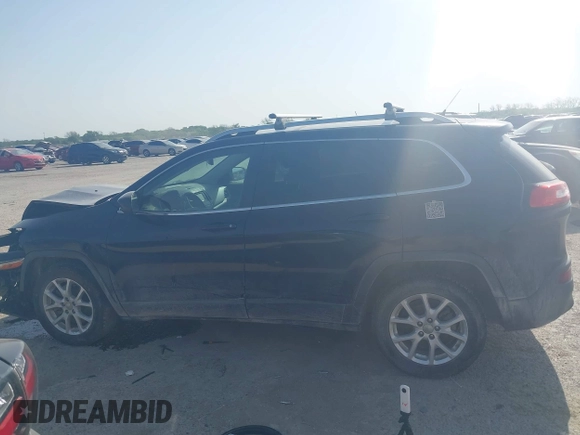 2015 Jeep Cherokee Latitude with VIN 1C4PJLCB9FW683459, listed as a IAAI auction lot 41998309 with 176,769 mi miles and . Bid and sale history available at carsss.com. Image 14.