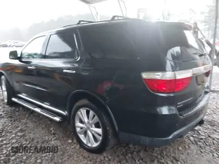 2013 Dodge Durango Crew with VIN 1C4SDJDT3DC509611, listed as a IAAI auction lot 41729805 with 161,357 mi miles. Bid and sale history available at carsss.com. Image 3.