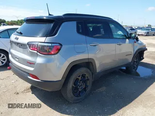 2023 Jeep Compass Trailhawk with VIN 3C4NJDDN2PT567047, listed as a IAAI auction lot 42376543 with 41,924 mi miles and . Bid and sale history available at DreamBid. Image 4.