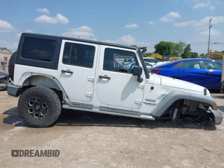 2012 Jeep Wrangler Unlimited Sport with VIN 1C4BJWDG7CL273102, listed as a IAAI auction lot 42288975 with 155,153 mi miles and . Bid and sale history available at DreamBid. Image 14.