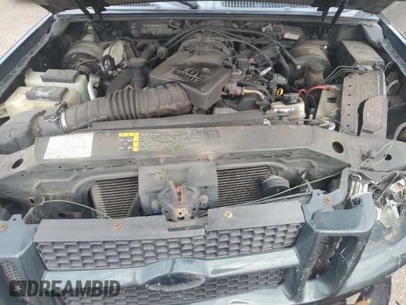 2004 Ford Explorer Sport Trac XLS z VIN 1FMZU77K24UB43103, wystawiony jako Copart lot #55955144 z przebiegiem 197 274 mil mil oraz Szkoda całkowita • Salvage title. Historia ofert i sprzedaży dostępna na DreamBid. Obrazek 11.