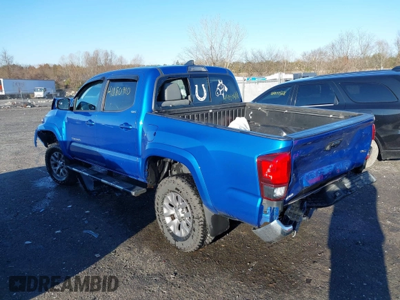 2018 Toyota Tacoma SR with VIN 3TMCZ5AN3JM138480, listed as a IAAI auction lot 41080910 with 99,225 mi miles. Bid and sale history available at carsss.com. Image 3.