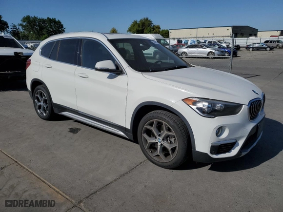 2019 BMW X1 xDrive28i with VIN WBXHT3C53K5L35670, listed as a Copart auction lot 53493245 with 14,201 mi miles and Salvage Title. Bid and sale history available at carsss.com. Image 4.
