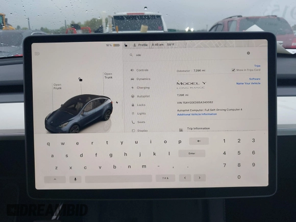 2025 Tesla Model Y Long Range with VIN 7SAYGDED8SA340082, listed as a IAAI auction lot 41915369 with 7,296 mi miles and . Bid and sale history available at DreamBid. Image 7.