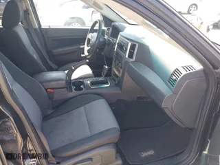 2010 Jeep Grand Cherokee Laredo with VIN 1J4PR4GK2AC104857, listed as a IAAI auction lot 42009569 with 131,986 mi miles. Bid and sale history available at carsss.com. Image 5.