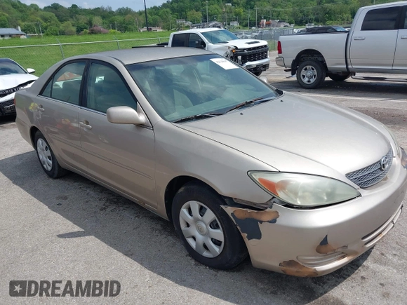 2003 Toyota Camry LE with VIN 4T1BE32K13U243738, listed as a IAAI auction lot 42120647 with Not Provided miles and . Bid and sale history available at DreamBid. Image 1.