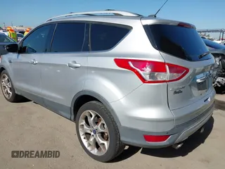 2015 Ford Escape Titanium with VIN 1FMCU0J90FUA43720, listed as a IAAI auction lot 42541048 with 98,948 mi miles and . Bid and sale history available at DreamBid. Image 3.