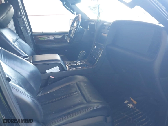 2015 Lincoln Navigator L with VIN 5LMJJ3JT0FEJ12569, listed as a IAAI auction lot 41909517 with 165,631 mi miles. Bid and sale history available at carsss.com. Image 5.