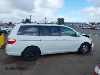2006 Honda Odyssey EX-L z VIN 5FNRL38766B452806, wystawiony jako IAAI lot #41931830 z przebiegiem 133 822 mil mil oraz . Historia ofert i sprzedaży dostępna na DreamBid. Obrazek 13.