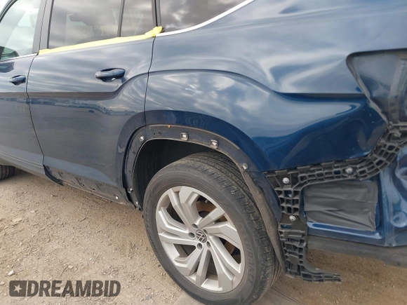2021 Volkswagen Atlas SE z VIN 1V2JR2CA3MC555490, wystawiony jako IAAI lot #41286240 z przebiegiem 89 435 mil mil oraz . Historia ofert i sprzedaży dostępna na DreamBid. Obrazek 19.