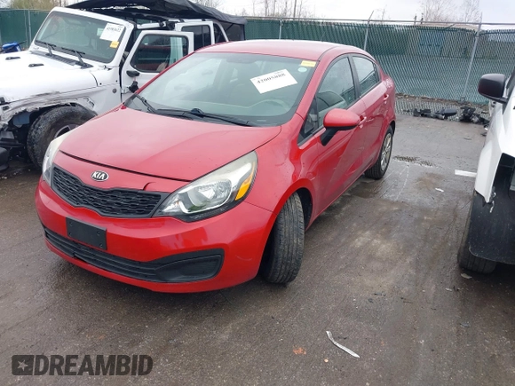 2014 Kia Rio LX with VIN KNADM4A36E6417050, listed as a IAAI auction lot 42005888 with 129,433 mi miles. Bid and sale history available at carsss.com. Image 2.