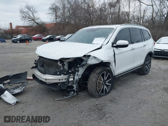2020 Honda Pilot Touring 8-Passenger with VIN 5FNYF6H96LB056229, listed as a IAAI auction lot 41738249 with 65,099 mi miles and . Bid and sale history available at DreamBid. Image 23.