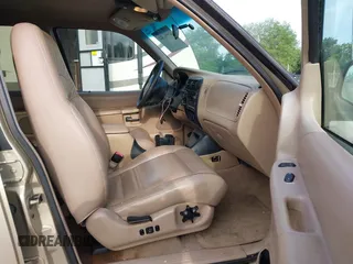 1999 Ford Explorer XLT with VIN 1FMZU34E3XUA80301, listed as a IAAI auction lot 42094304 with 145,373 mi miles and . Bid and sale history available at DreamBid. Image 5.