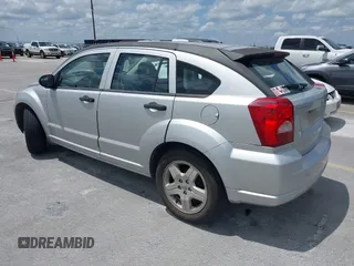 2008 Dodge Caliber SE with VIN 1B3HB28B98D757953, listed as a IAAI auction lot 42111663 with 115,977 mi miles. Bid and sale history available at carsss.com. Image 3.