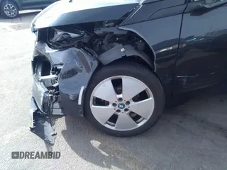2014 BMW i3 z VIN WBY1Z4C53EV272852, wystawiony jako IAAI lot #40131624 z przebiegiem 38 490 mil mil oraz . Historia ofert i sprzedaży dostępna na DreamBid. Obrazek 6.