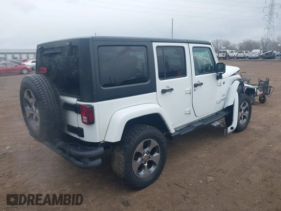 2017 Jeep Wrangler Unlimited 75th Anniversary z VIN 1C4BJWEG9HL684152, wystawiony jako IAAI lot #41880074 z przebiegiem 91 847 mil mil oraz . Historia ofert i sprzedaży dostępna na DreamBid. Obrazek 4.