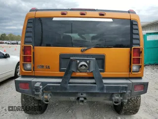 2006 Hummer H2 with VIN 5GRGN23U46H115817, listed as a Copart auction lot 73933564 with 128,671 mi miles and Salvage Title. Bid and sale history available at carsss.com. Image 6.