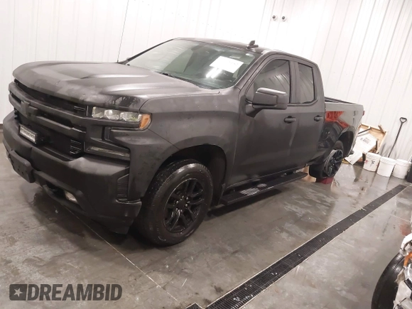 2021 Chevrolet Silverado 1500 RST with VIN 1GCRYEEDXMZ135111, listed as a IAAI auction lot 41398152 with 54,051 mi miles and . Bid and sale history available at DreamBid. Image 2.