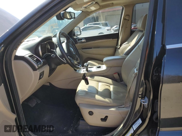 2014 Jeep Grand Cherokee Limited z VIN 1C4RJFBG3EC156735, wystawiony jako Copart lot #49113995 z przebiegiem 121 547 mil mil oraz Szkoda całkowita • Salvage title. Historia ofert i sprzedaży dostępna na DreamBid. Obrazek 7.