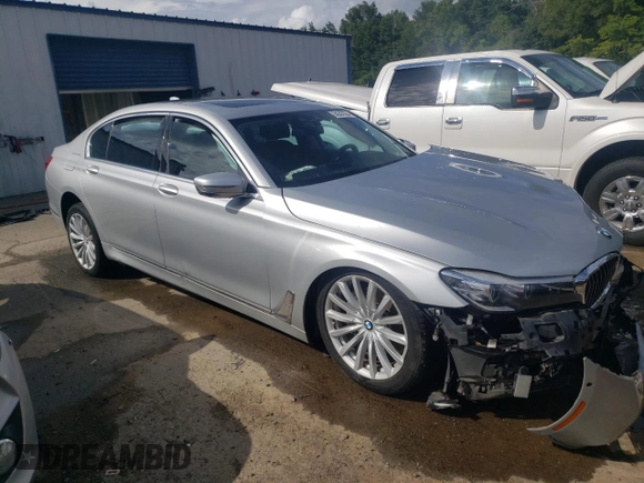 2017 BMW 7 Series 740i with VIN WBA7E2C52HG739521, listed as a Copart auction lot 64263324 with 0 mi miles and Salvage Title. Bid and sale history available at carsss.com. Image 4.