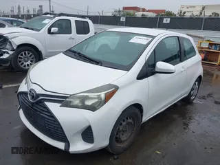 2015 Toyota Yaris L with VIN VNKJTUD30FA030021, listed as a IAAI auction lot 41805928 with 188,849 mi miles and . Bid and sale history available at carsss.com. Image 2.