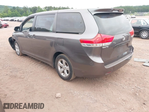 2014 Toyota Sienna L with VIN 5TDZK3DC8ES470837, listed as a IAAI auction lot 42426844 with 302,661 mi miles and . Bid and sale history available at DreamBid. Image 3.