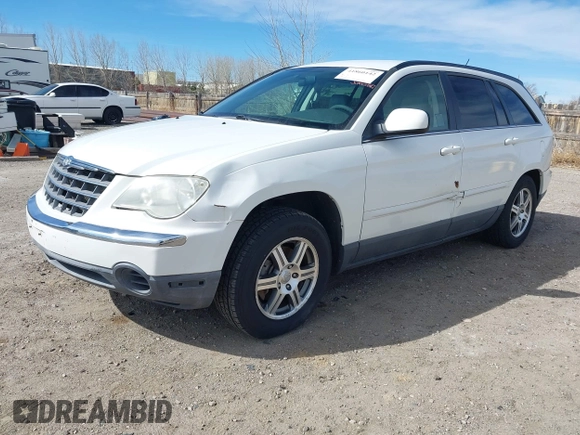 2007 Chrysler Pacifica Touring z VIN 2A8GM68X27R196197, wystawiony jako IAAI lot #41860142 z przebiegiem 131 361 mil mil oraz . Historia ofert i sprzedaży dostępna na DreamBid. Obrazek 2.