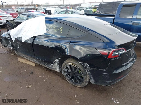 2023 Tesla Model 3 with VIN 5YJ3E1EA1PF512562, listed as a IAAI auction lot 41719618 with 43,612 mi miles. Bid and sale history available at carsss.com. Image 3.