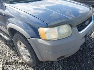 2002 Ford Escape XLT Choice with VIN 1FMYU04172KA40251, listed as a IAAI auction lot 41895889 with 214,935 mi miles and . Bid and sale history available at carsss.com. Image 6.