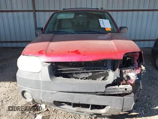 2005 Ford Escape XLT with VIN 1FMCU03155KC43333, listed as a IAAI auction lot 41391655 with 217,211 mi miles. Bid and sale history available at carsss.com. Image 12.