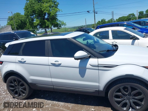 2015 Land Rover Range Rover Evoque Pure Premium z VIN SALVR2BG2FH075464, wystawiony jako IAAI lot #42268278 z przebiegiem 135 426 mil mil oraz . Historia ofert i sprzedaży dostępna na DreamBid. Obrazek 14.