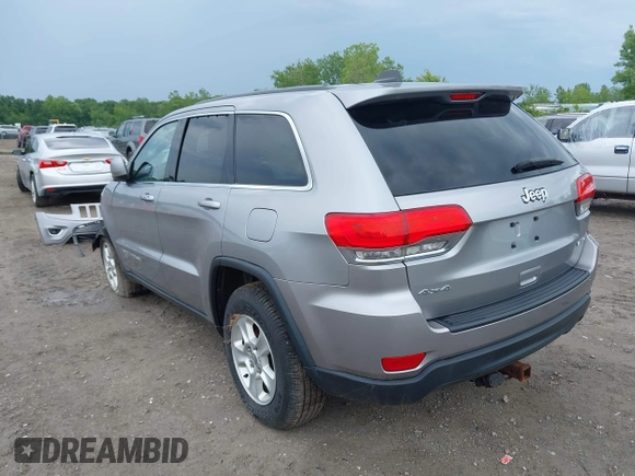 2016 Jeep Grand Cherokee Laredo with VIN 1C4RJFAG3GC366613, listed as a IAAI auction lot 42503974 with 156,013 mi miles and . Bid and sale history available at DreamBid. Image 3.