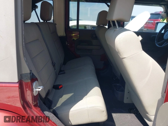 2007 Jeep Wrangler Unlimited Sahara with VIN 1J4GA59187L116585, listed as a IAAI auction lot 41996297 with 151,961 mi miles and . Bid and sale history available at DreamBid. Image 8.