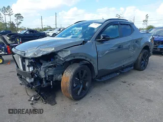 2023 Hyundai Santa Cruz Night Edition z VIN 5NTJCDAF0PH054192, wystawiony jako IAAI lot #40734723 z przebiegiem 9 700 mil mil oraz . Historia ofert i sprzedaży dostępna na DreamBid. Obrazek 18.