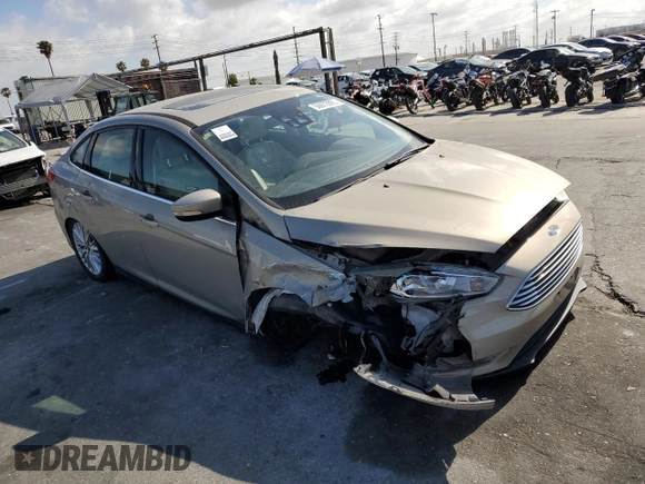 2015 Ford Focus Titanium с VIN 1FADP3J28FL288037, выставлен на аукционе Copart как лот 56972865 с пробегом 75 703 миль миль и Списание • Salvage title. История ставок и продаж доступна на DreamBid. Изображение 4.