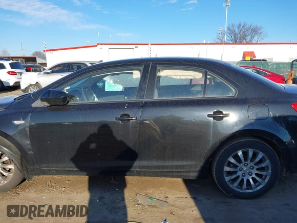 2010 Suzuki Kizashi SE with VIN JS2RE9A34A6100807, listed as a IAAI auction lot 41690974 with 122,419 mi miles and . Bid and sale history available at DreamBid. Image 14.