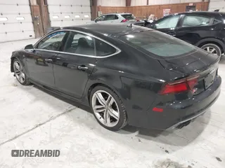 2016 Audi S7 with VIN WAUW2AFC5GN010917, listed as a IAAI auction lot 41785569 with 33,761 mi miles. Bid and sale history available at carsss.com. Image 3.