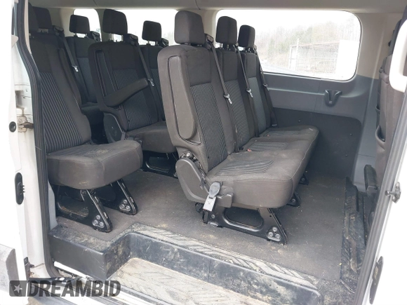2019 Ford Transit Passenger XL z VIN 1FBZX2YM8KKA31871, wystawiony jako IAAI lot #41168344 z przebiegiem 95 957 mil mil oraz . Historia ofert i sprzedaży dostępna na DreamBid. Obrazek 8.