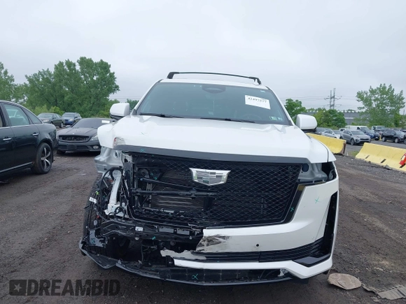 2024 Cadillac Escalade 4WD Sport Platinum with VIN 1GYS4GKL2RR140583, listed as a IAAI auction lot 42497577 with 9,887 mi miles and . Bid and sale history available at DreamBid. Image 12.