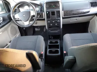 2010 Dodge Grand Caravan SXT with VIN 2D4RN5D16AR496795, listed as a Copart auction lot 83374834 with 99,902 mi miles and Salvage Title. Bid and sale history available at DreamBid. Image 8.
