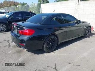 2015 BMW M4 z VIN WBS3U9C51FJ968052, wystawiony jako IAAI lot #42301612 z przebiegiem 80 556 mil mil oraz . Historia ofert i sprzedaży dostępna na DreamBid. Obrazek 4.