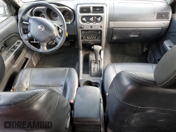 2004 Nissan Frontier LE z VIN 1N6ED27T14C460890, wystawiony jako Copart lot #55610435 z przebiegiem 218 988 mil mil oraz Szkoda całkowita • Salvage title. Historia ofert i sprzedaży dostępna na DreamBid. Obrazek 8.