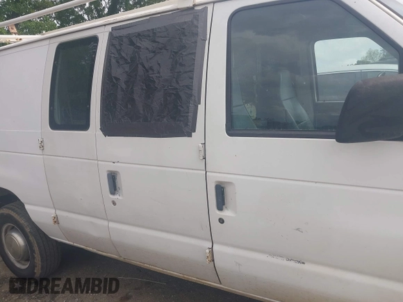 1993 Ford Econoline Cargo with VIN 1FTJE34H2PHA67802, listed as a IAAI auction lot 42127936 with 263,379 mi miles and . Bid and sale history available at DreamBid. Image 6.