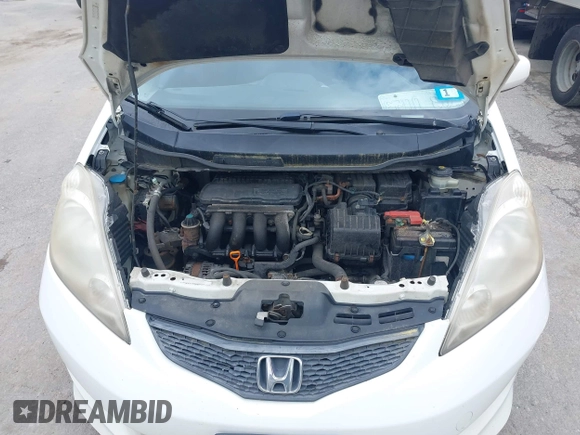 2011 Honda Fit Sport z VIN JHMGE8H51BC016707, wystawiony jako IAAI lot #42341893 z przebiegiem 326 759 mil mil oraz . Historia ofert i sprzedaży dostępna na DreamBid. Obrazek 10.