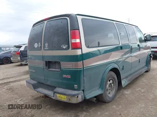 2003 GMC Savana Commercial C6Y with VIN 1GDFG15TX31195422, listed as a IAAI auction lot 41695121 with 214,454 mi miles. Bid and sale history available at carsss.com. Image 4.