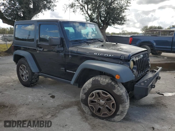 2016 Jeep Wrangler Rubicon with VIN 1C4BJWCG3GL162649, listed as a Copart auction lot 86327414 with 131,407 mi miles and Salvage title. Bid and sale history available at DreamBid. Image 4.