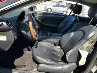 2006 Mercedes-Benz CLK-Class 5.0L with VIN WDBTK75G96T063299, listed as a Copart auction lot 69882884 with 148,934 mi miles and Salvage Title. Bid and sale history available at carsss.com. Image 7.