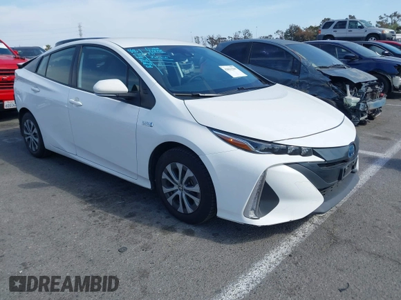 2021 Toyota Prius LE with VIN JTDKAMFP7M3197111, listed as a IAAI auction lot 42031569 with 240,098 mi miles and . Bid and sale history available at DreamBid. Image 1.