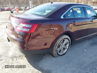 2018 Ford Taurus SEL with VIN 1FAHP2H80JG111358, listed as a IAAI auction lot 41574396 with 112,448 mi miles. Bid and sale history available at carsss.com. Image 4.