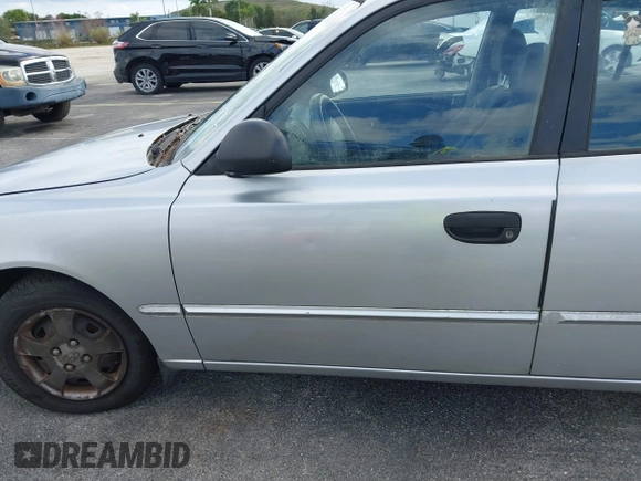 2002 Hyundai Accent GL with VIN KMHCG45C52U378454, listed as a IAAI auction lot 41418653 with 173,564 mi miles. Bid and sale history available at carsss.com. Image 6.